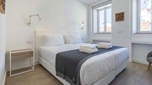 Iron/ironing board, travel crib, free WiFi, bed sheets