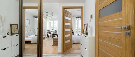 1 bedroom, desk, iron/ironing board, travel crib