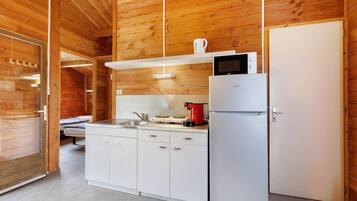 Fridge, microwave, stovetop, coffee/tea maker