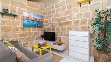 Townhouse, 3 soverom, aircondition, byutsikt | Oppholdsområde