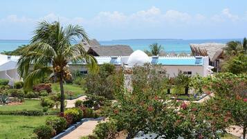 Deluxe Double Room, Pool View | Desk, laptop workspace, iron/ironing board, free WiFi