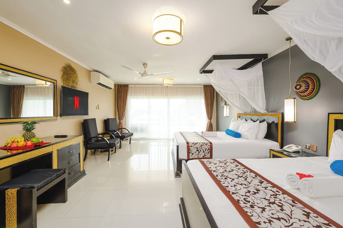 Suite junior, vistas al jardín | Minibar, escritorio, espacio para trabajar con un portátil
