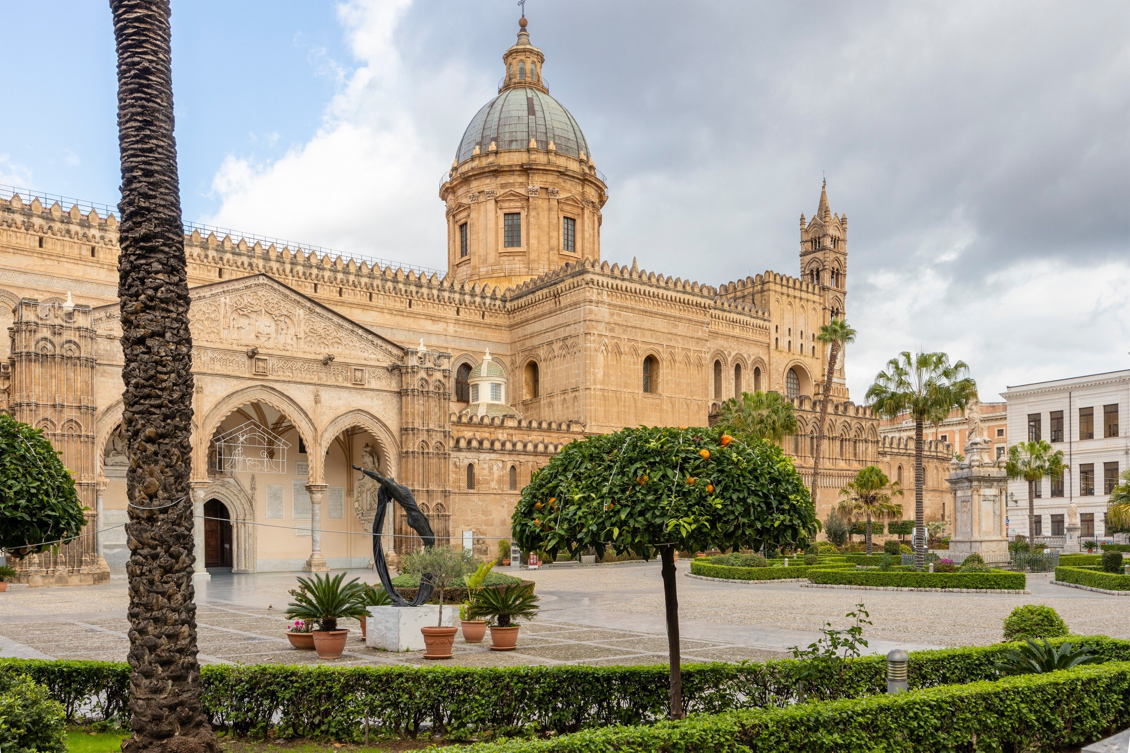 A historic building with a large dome and arched windows.