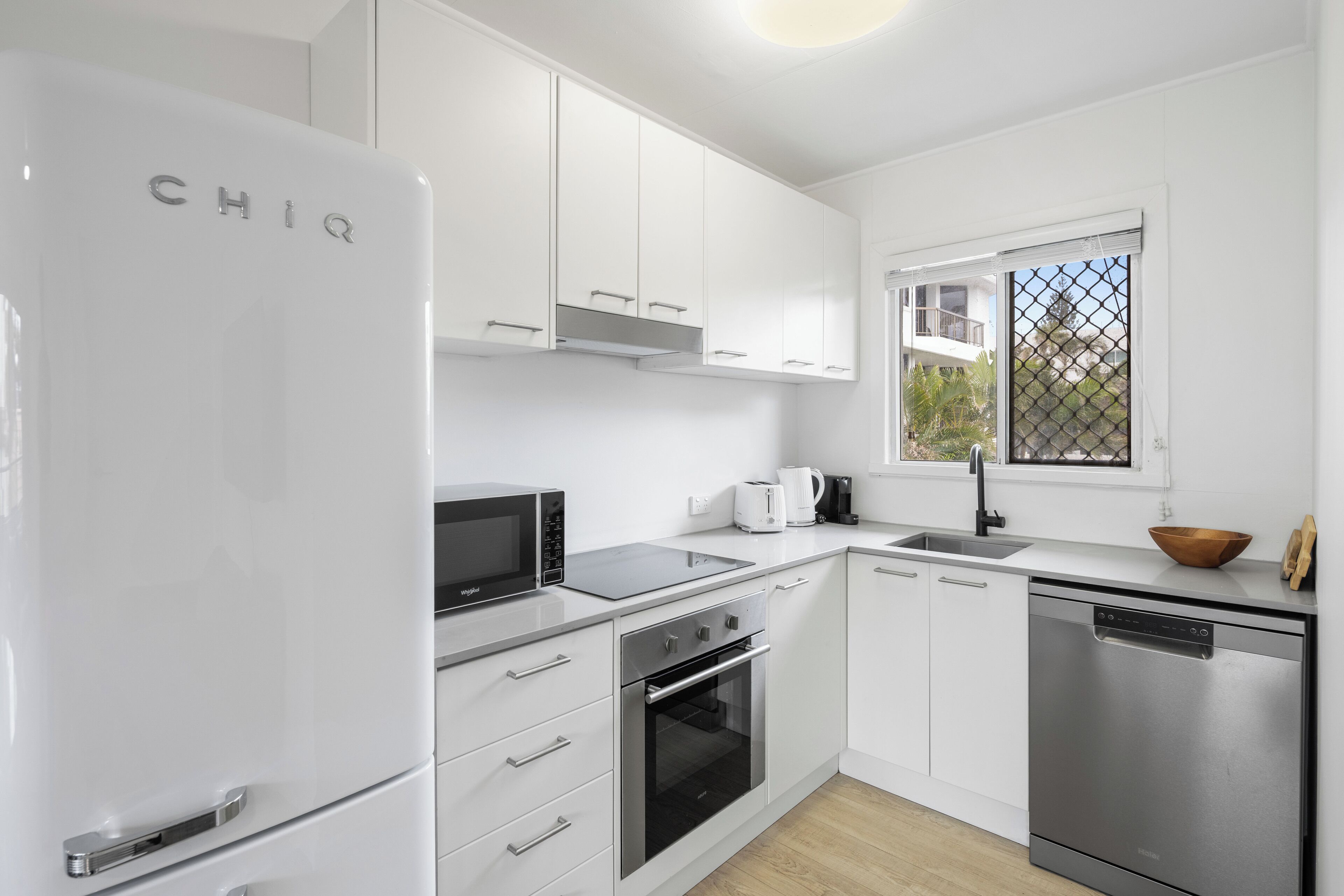 Apartamento, vista parcial para o oceano | Cozinha privada