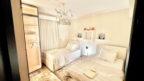 2 slaapkamers, een strijkplank/strijkijzer, wifi, beddengoed