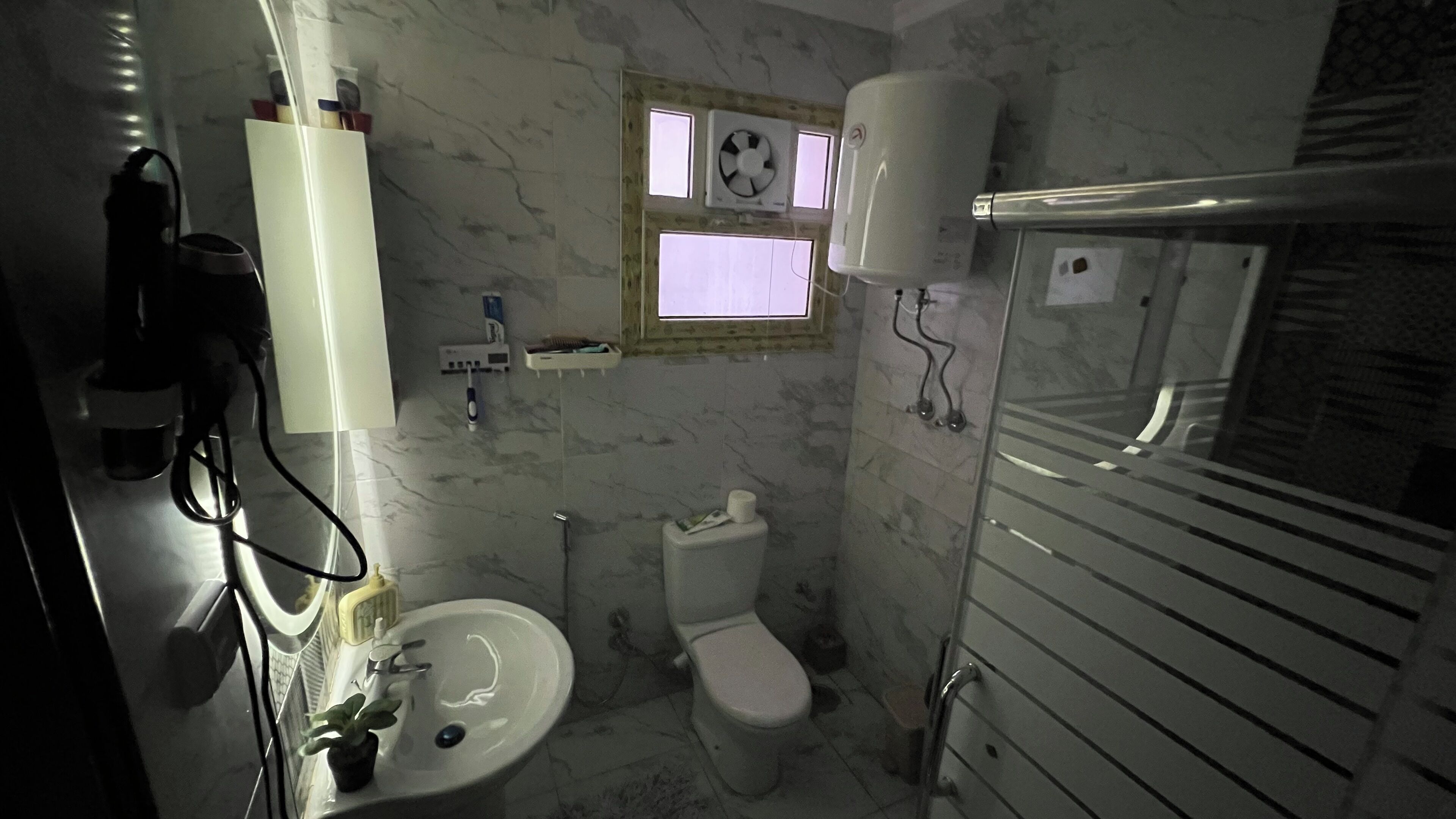 Hair dryer, towels, soap, toilet paper