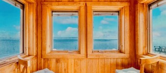 Peaceful Getaway At Bayfront Lighthouse.  Escape To A Serene Destination.