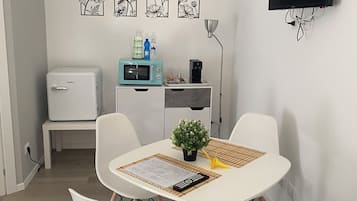 Apartamento Deluxe, patio | Zona de estar