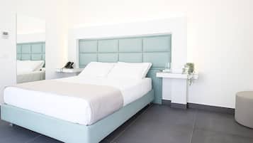 Standard-Doppel- oder -Zweibettzimmer | Zimmersafe, kostenlose Babybetten, kostenloses WLAN, BettwÀsche