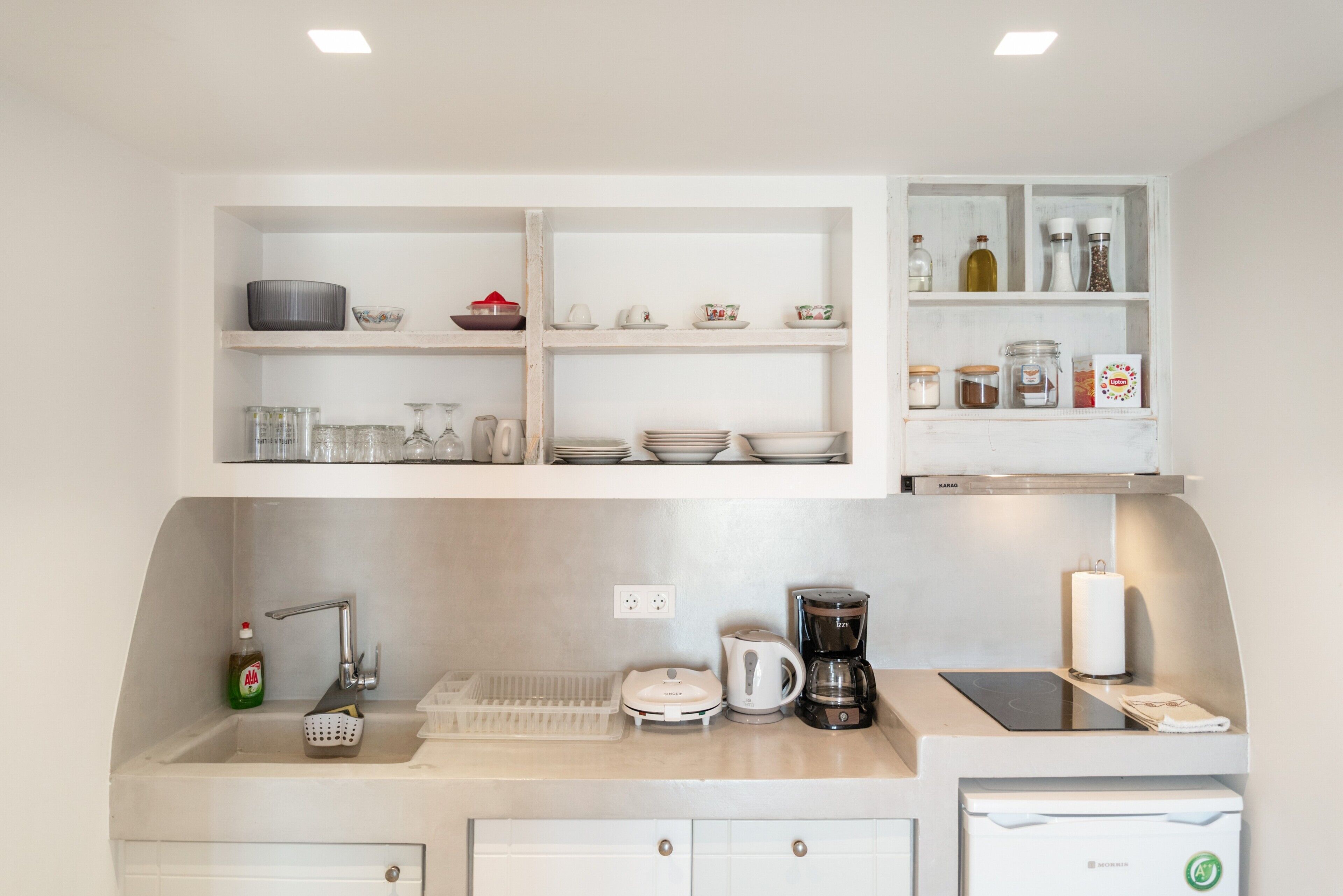 Coffee/tea maker, fridge, stovetop, dishwasher