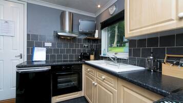 Fridge, microwave, oven, dining tables