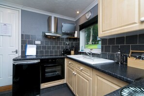 Fridge, microwave, oven, dining tables