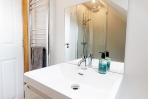 Hair dryer, towels, soap, shampoo