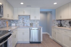 Fridge, microwave, oven, stovetop - Be A Nomad - Calm Oceanfront Retreat (Jacksonville Beach)