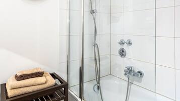 Hair dryer, towels, soap, toilet paper