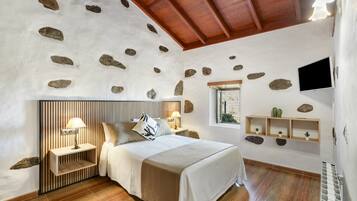 Tabla de planchar con plancha, wifi y ropa de cama