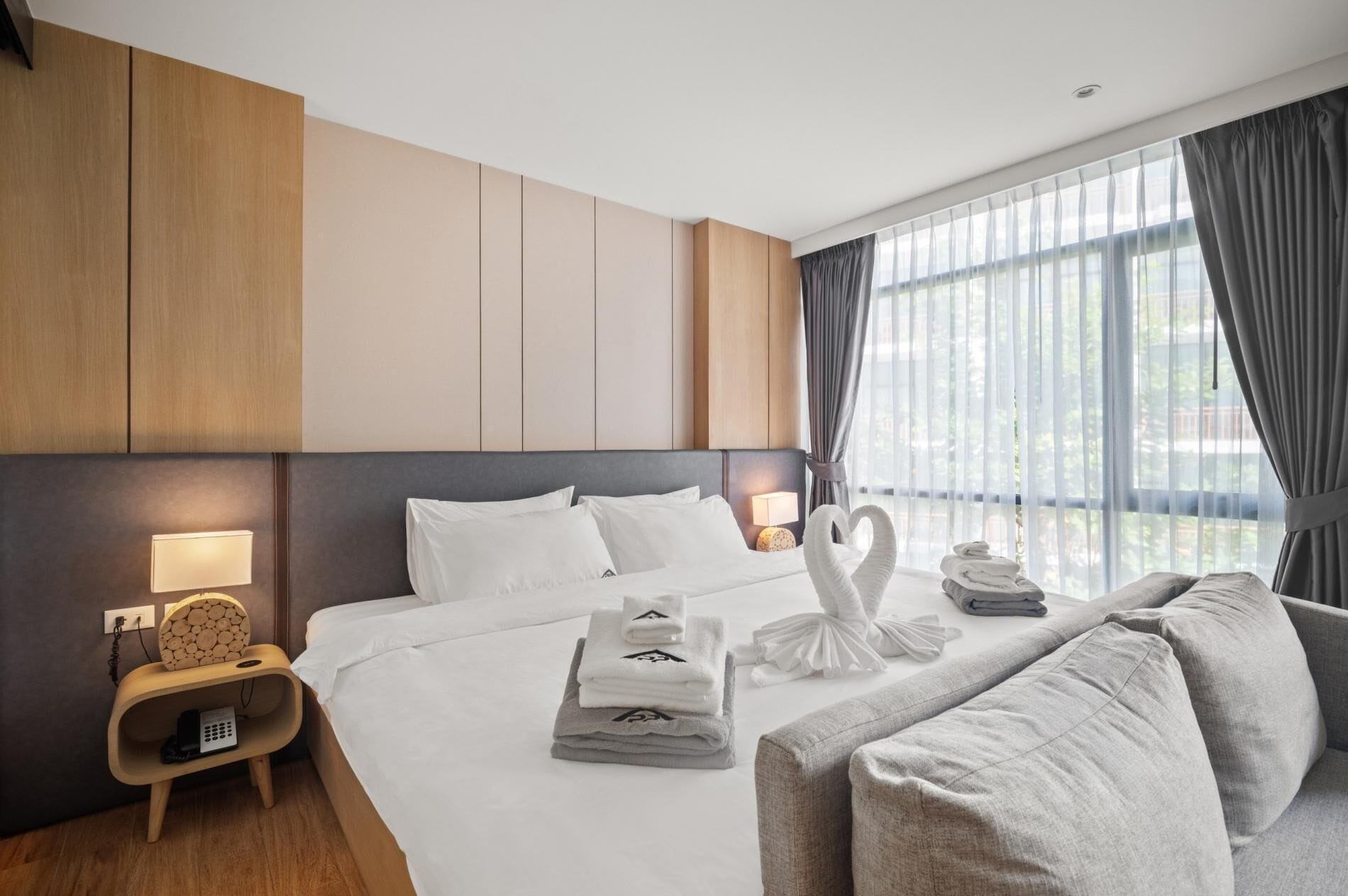 Apartemen Deluks (0 Bedroom) | 1 kamar tidur, setrika/meja setrika, dan tempat tidur bayi gratis