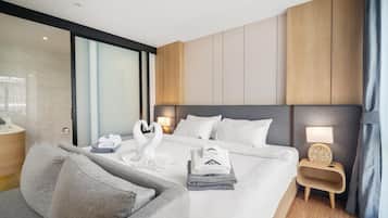 Apartemen Deluks (0 Bedroom) | 1 kamar tidur, setrika/meja setrika, dan tempat tidur bayi gratis