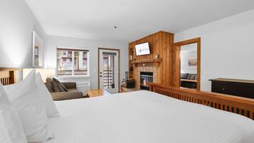 Tabla de planchar con plancha, wifi gratis y ropa de cama