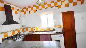 Apartment | Private kitchen | Fridge, oven, stovetop, coffee/tea maker