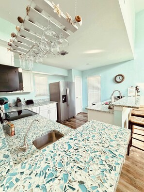 Townhome, Multiple Beds, Patio (Saltwater Solace) | Private kitchen | Dining tables - Saltwater Solace, For 8 (Galveston)
