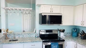 Townhome, Multiple Beds, Patio (Saltwater Solace) | Private kitchen | Dining tables