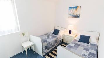 Apartamento | 4 quartos, individualmente mobiliados, ferros/tábuas de passar roupa