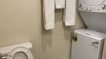 Shower, towels, soap, toilet paper