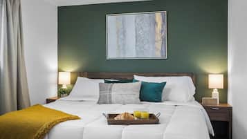 2 habitaciones, tabla de planchar con plancha y cuna de viaje