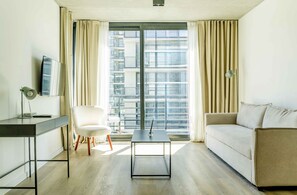 Studio Suite | Living area - RentUp Suites Palmas Park Buenavista (Victoria)