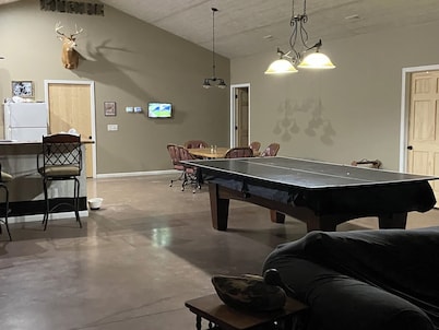 Family Retreat with pool table and double bunks.