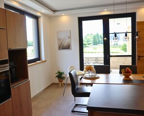 Villa | Private kitchen | Highchair - Eifel Finca With Whirlpool and Garden Lounge (Wiesbaum)