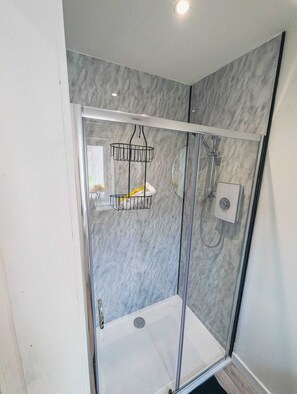 Towels, soap, toilet paper - A stylish modern studio stay near attractions with comfy room and vibrant design (Denny)