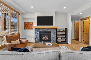 TV, fireplace - Alpine Condo | Steps to Dining, Trails & Parks (Canmore)