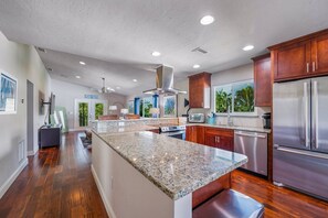 Fridge, microwave, oven, stovetop - Decked Out: Steps to Bay & Beach, Pool, Games by Anna Maria Life Vacation Rentals (Anna Maria)