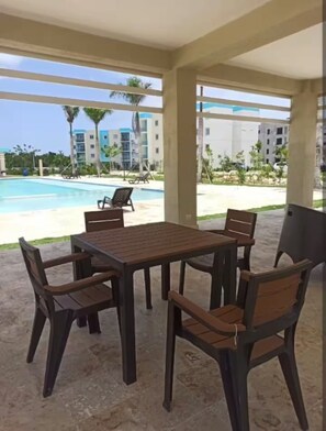 Outdoor dining - Cozy Apartment in Punta Cana, Serena Village (Punta Cana)