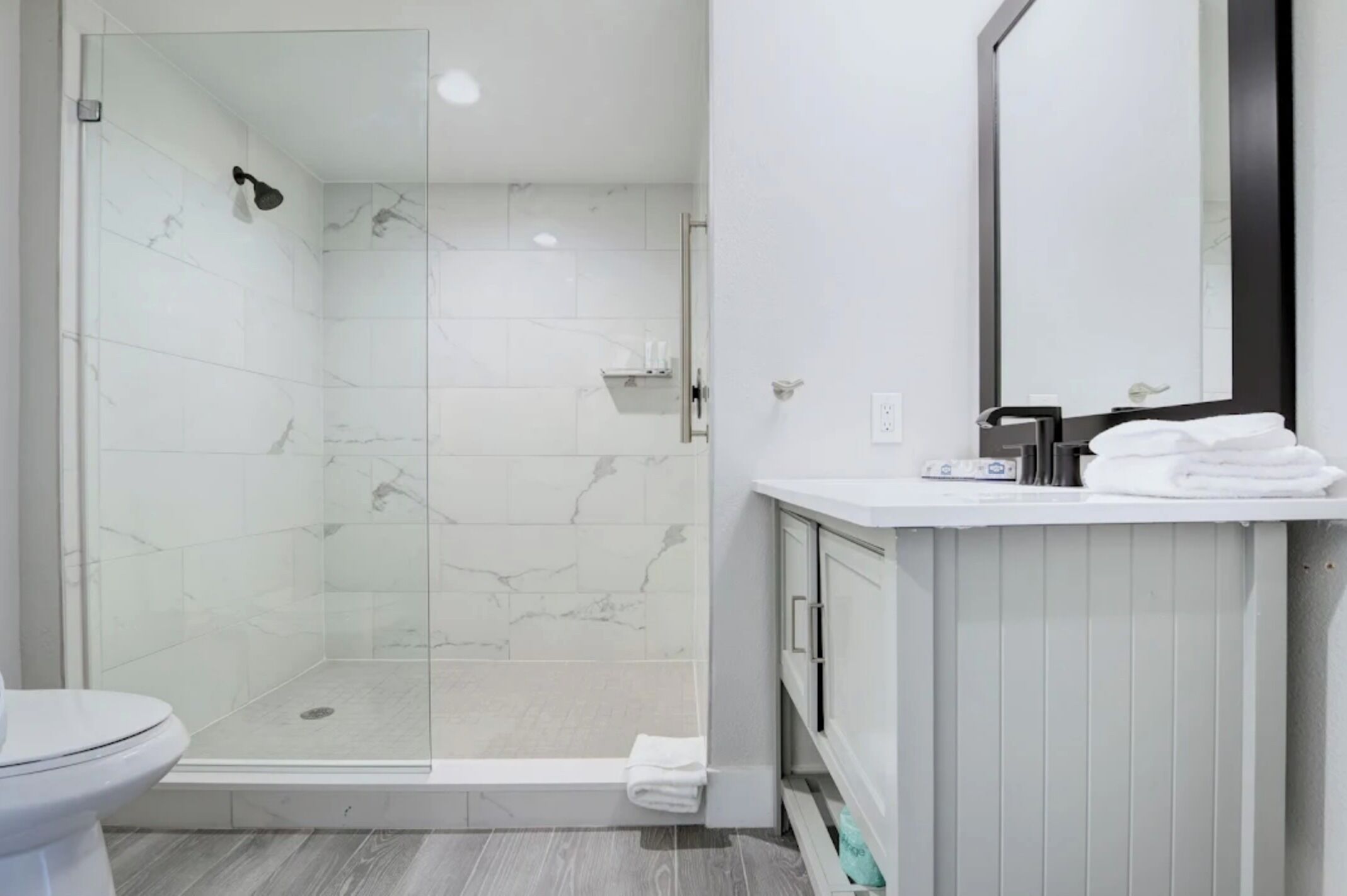 Hair dryer, towels, soap, toilet paper