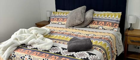 Coffres-forts dans les chambres, fer et planche Ă repasser