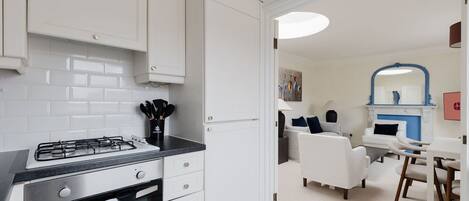 Fridge, oven, dishwasher, coffee/tea maker