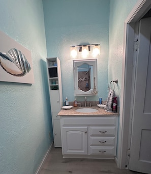 Hair dryer, towels, soap, shampoo