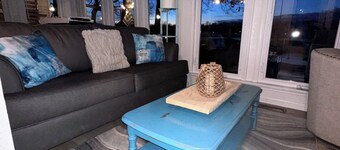 Serene Lake-Level Retreat with Picture Windows & 65” TV for Ultimate Relaxation