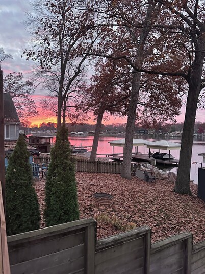 Lake-Level Retreat w Hot Tub, Picture Windows & 65” TV for Ultimate Relaxation