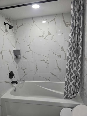 Hair dryer, towels, soap, shampoo