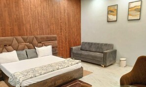 Deluxe Room, Air conditioning | Desk, laptop workspace, free WiFi