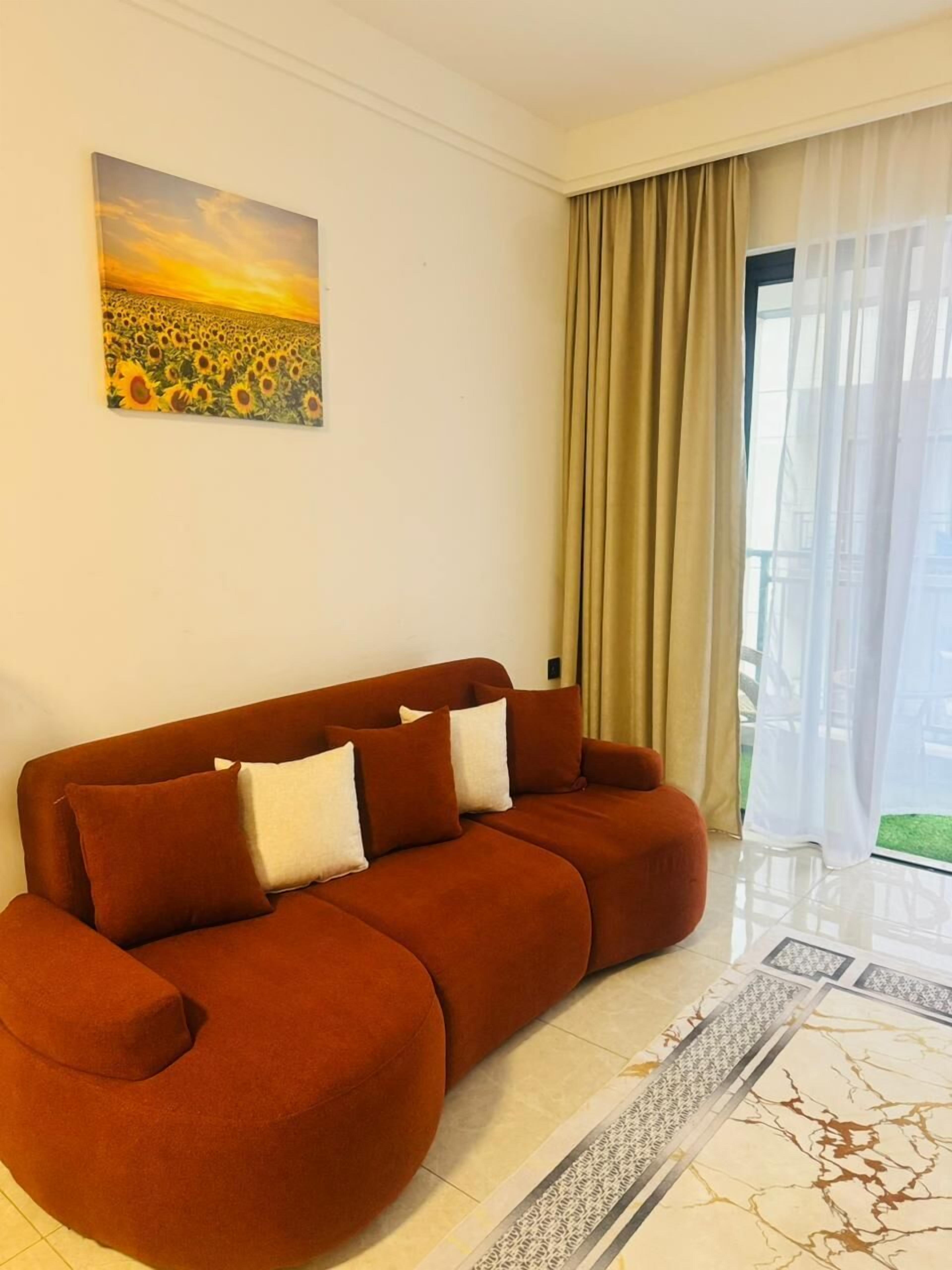 Comfort Apartment | Living area | 32-inch Smart TV with digital channels