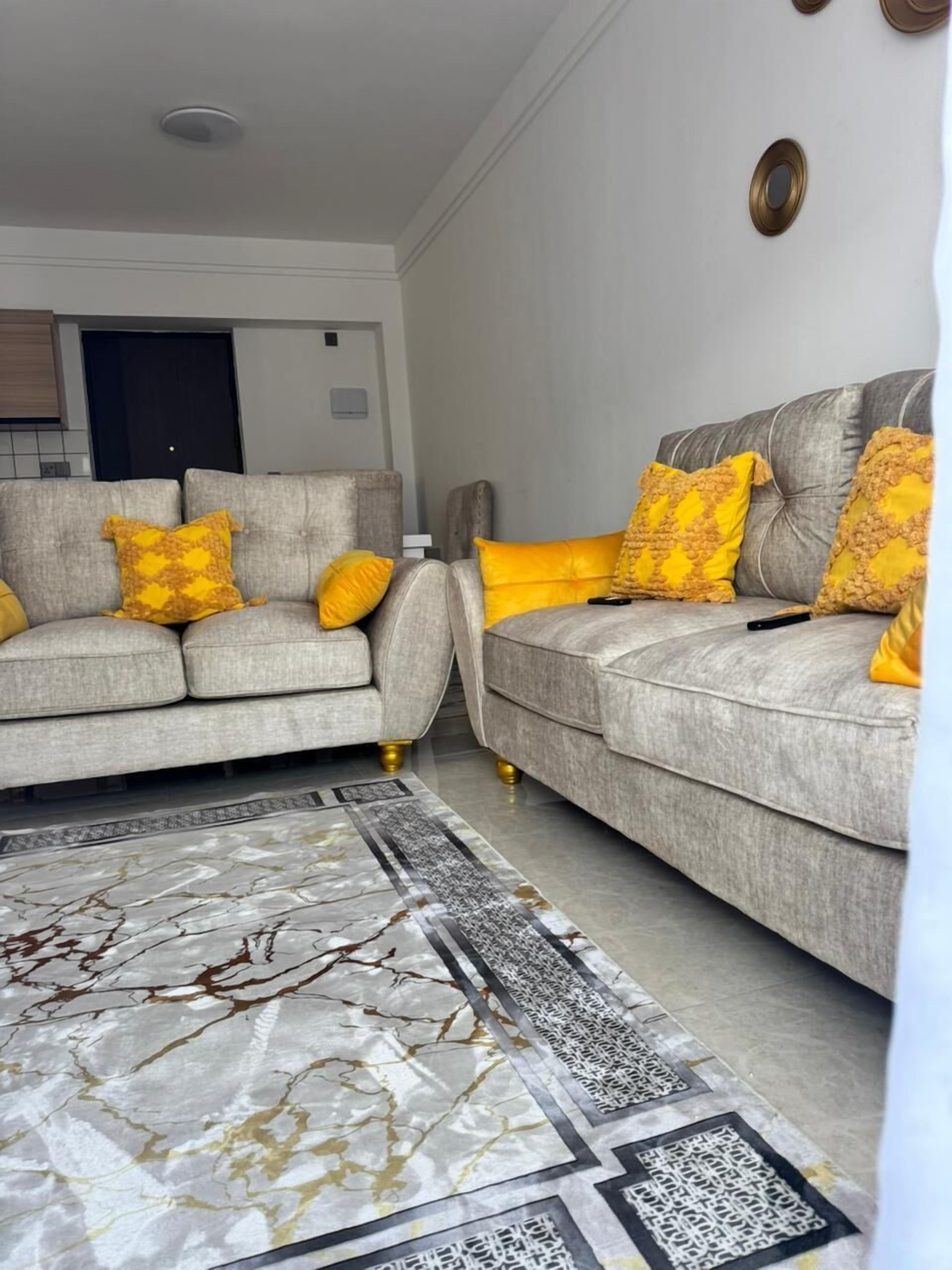 Classic Apartment, Balcony, City View | Living area | 32-inch Smart TV with digital channels