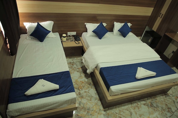 Deluxe Triple Room | Free WiFi - BEST BUY HOTEL (Kolkata)