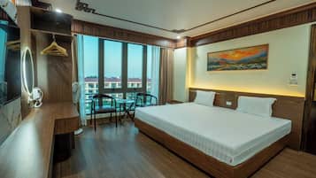 Deluxe Room, City View | Blackout drapes, soundproofing, iron/ironing board, free WiFi