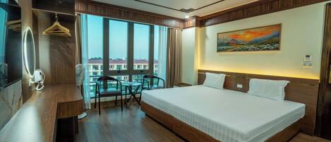 Rideaux occultants, chambres insonorisées, fer et planche à repasser