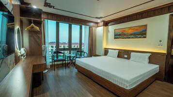 Habitación Deluxe, vistas a la ciudad | Cortinas opacas y sistema de insonorización